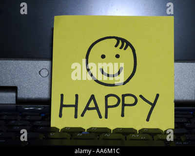memo note on notebook, Happy drawing with smiley Stock Photo