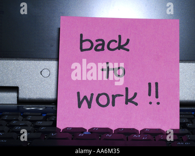 memo note on notebook back to work Stock Photo
