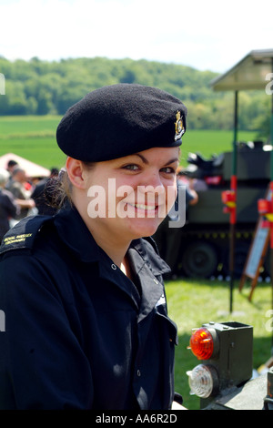 Female soldier of the Royal Tank Regiment at a recruiting exhibition. Stock Photo