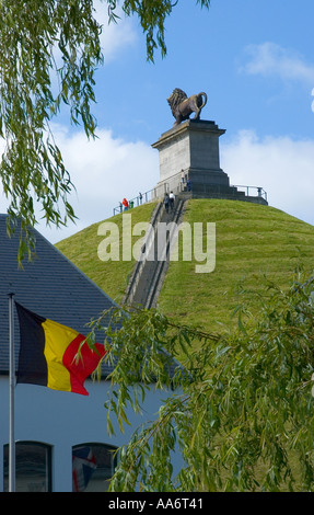 The Butte de Lion at the site of the Battle of Waterloo June 18 1815 visitor centre and belgian flag Stock Photo