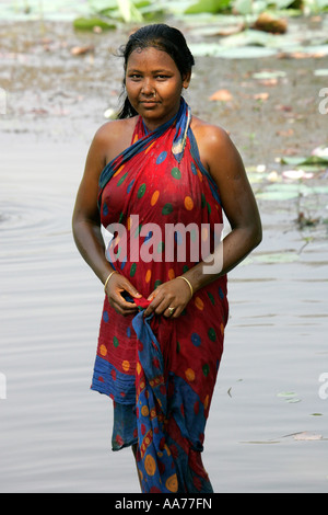 Woman bathing at Bolgarh village, Orissa, India Stock Photo