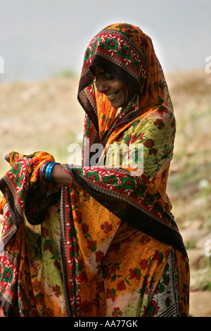 Woman bathing at Bolgarh village, Orissa, India Stock Photo