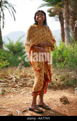 Woman bathing at Bolgarh village, Orissa, India Stock Photo