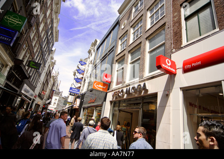 The popular shopping thoroughfare Kalverstraat in the centre of Amsterdam Holland Stock Photo