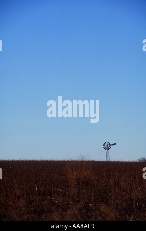 isolated windmill in empty paddock Stock Photo