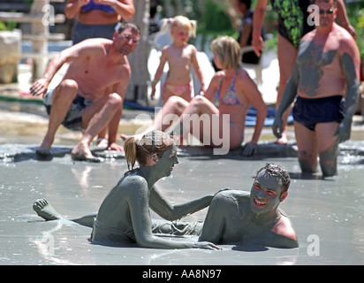 Tourists enjoy the Mud Baths at Dalyan in Turkey Stock Photo