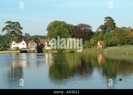 View of the Mill Pond and House at Beaulieu Hampshire England United Kingdom UK Stock Photo