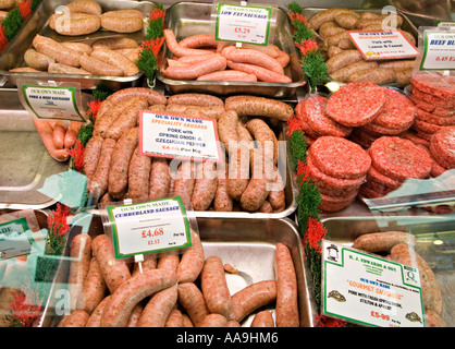 Butcher's display of home made sausages and beefburgers for sale in shop Abergavenny Wales UK Stock Photo
