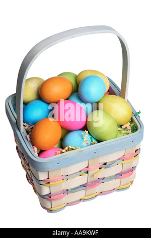 Easter basket filled with colored eggs. Stock Photo