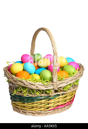Easter basket filled with colored eggs. Stock Photo