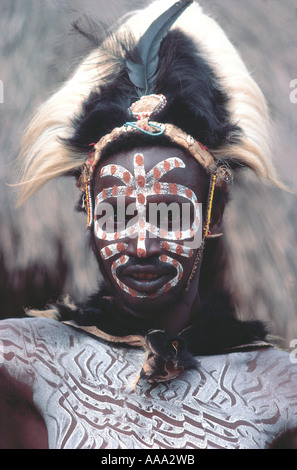 Close up portrait of traditional Kikuyu man wearing a cap made from Colobus Monkey skin Stock Photo