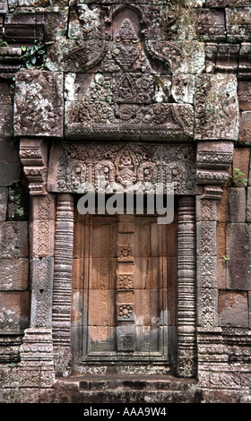 Carved stone door and elaborate lintel at Wat Phou in southern Laos Stock Photo