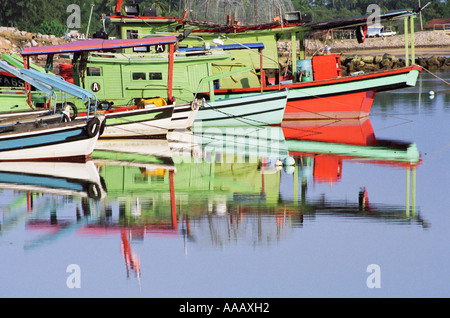 Reflection Of Fishing Boats Stock Photo
