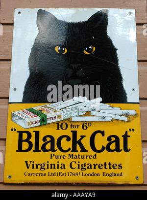 black cat virginia cigarettes sign Black Cat Cigarette sign Stock Photo