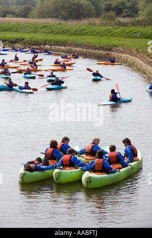 UK Cornwall Bude children learning to canoe in the River Neet Stock Photo