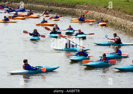 UK Cornwall Bude children learning to canoe in the River Neet Stock Photo