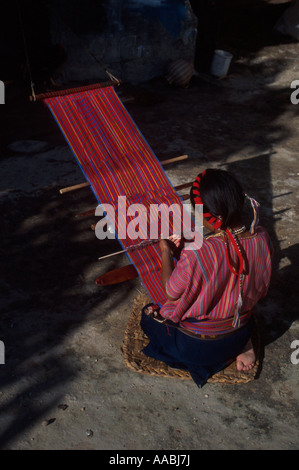 A woman in San Antonio Palopo weaving a huipil a typical Guatemaltecan skirt Stock Photo