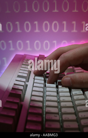 computer keyboard with hand and numerical code Stock Photo