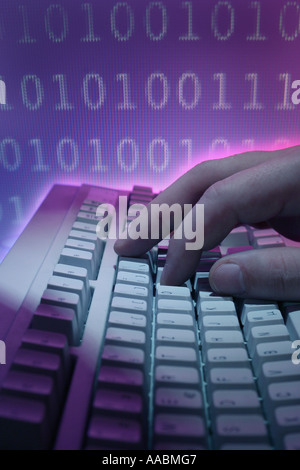 computer keyboard with hand and numerical code Stock Photo