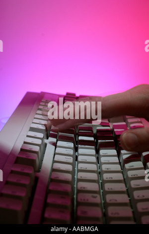 computer keyboard with hand and numerical code Stock Photo