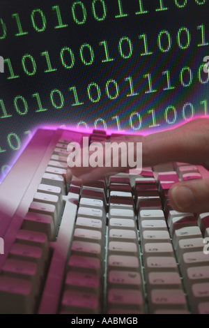 computer keyboard with hand and numerical code Stock Photo