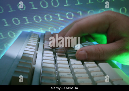 computer keyboard with hand and numerical code Stock Photo