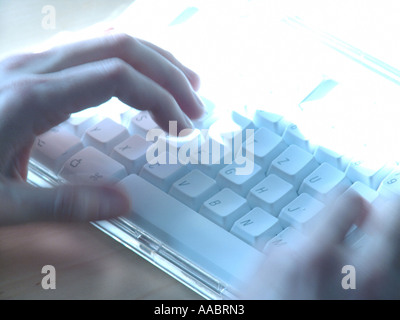 hands on a keyboard Stock Photo