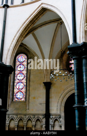 The interior columns and stained glass windows of the round part of Temple Church London Stock Photo