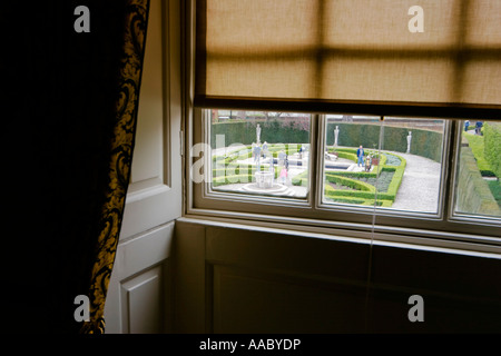 The view from Kew Palace onto the Queen's formal herb garden and the river Thames London UK Stock Photo