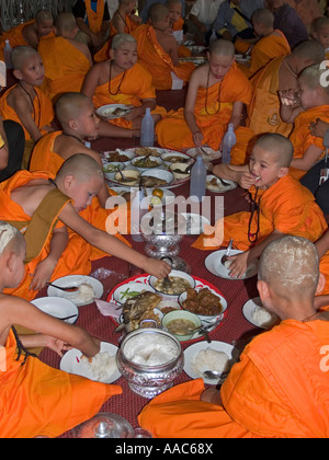 novice Thai monks feasting Poi Sang Long festival Thailand Stock Photo