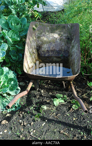 wheelbarrow in the garden Stock Photo
