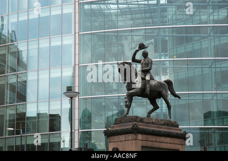 Statue of Albert Prince Consort seen against the Sainsburys headquarters building in High Holborn London UK Stock Photo
