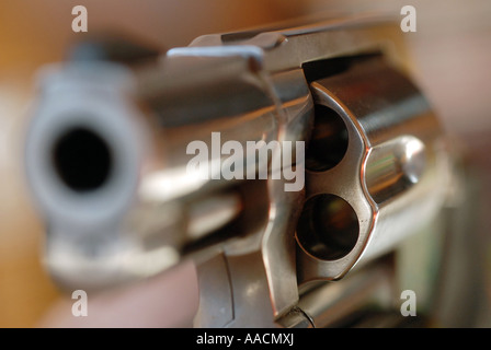 Close-up of a Smith & Wesson Model 60 .357 magnum /.38 special snub-nosed revolver pointed directly at the camera Stock Photo