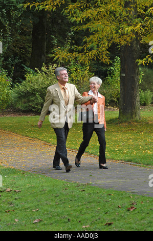Pair of senior citizens in the park Stock Photo