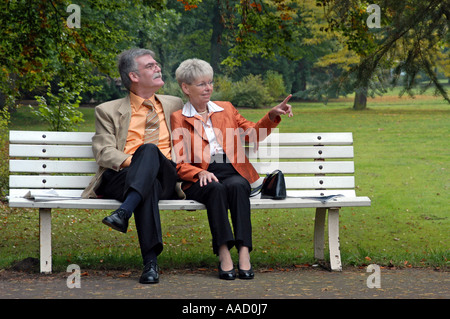 Pair of senior citizens in the park Stock Photo