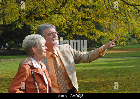 Pair of senior citizens in the park Stock Photo