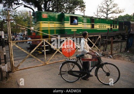 India Kerala Railway crossing in a small town near Kollam 2006 Stock Photo
