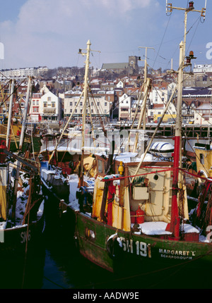 Fishing boats in winter, outer harbour, Scarborough, North Yorkshire, England, UK. Stock Photo