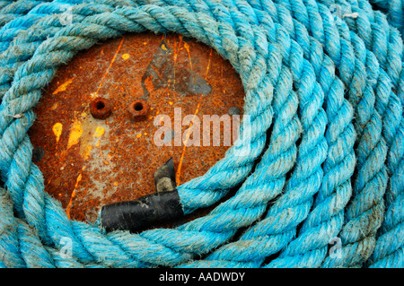 Rope coil on a rusty deck Stock Photo