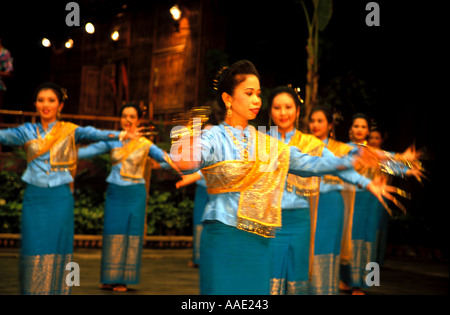 Thai cultural dancers at the Rose Garden Cultural Show for tourists in Bangkok, Thailand performing for an audience of visitors to the show Stock Photo