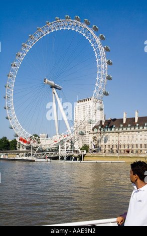 "British Airways London Eye" Tourist looks on Stock Photo