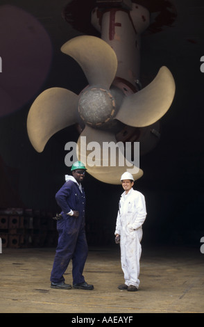 Dock workers in Freeport, Bahamas Stock Photo