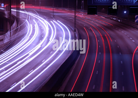 Night time shot of speeding traffic on a freeway Stock Photo