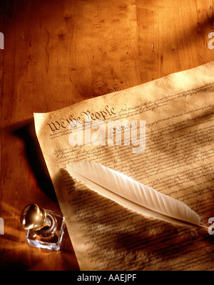 u.s. constitution on wood surface with ink and ink quill Stock Photo