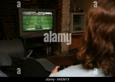 0141 Male Playing computer game Stock Photo