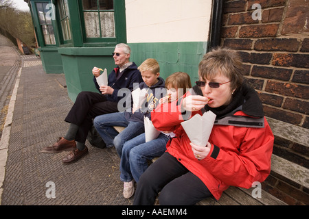 UK England West Midlands Dudley Black Country Museum the Donaldson family eating fish and chips Stock Photo