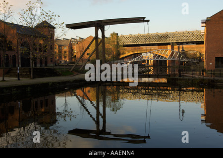 Bridges old and new in the regeneration area of Castlefield Manchester Stock Photo