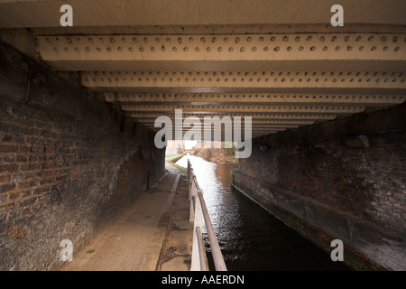 Canal towpath, underneath bridge over Ashton Canal, Carruthers Street, Ancoats, Manchester, UK Stock Photo