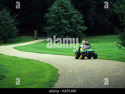 Brothers On Electric Jeep in the uk Stock Photo