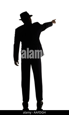 Business Concept Man Black Suit Hat Fedora Pointing Standing Moving Stock Photo
